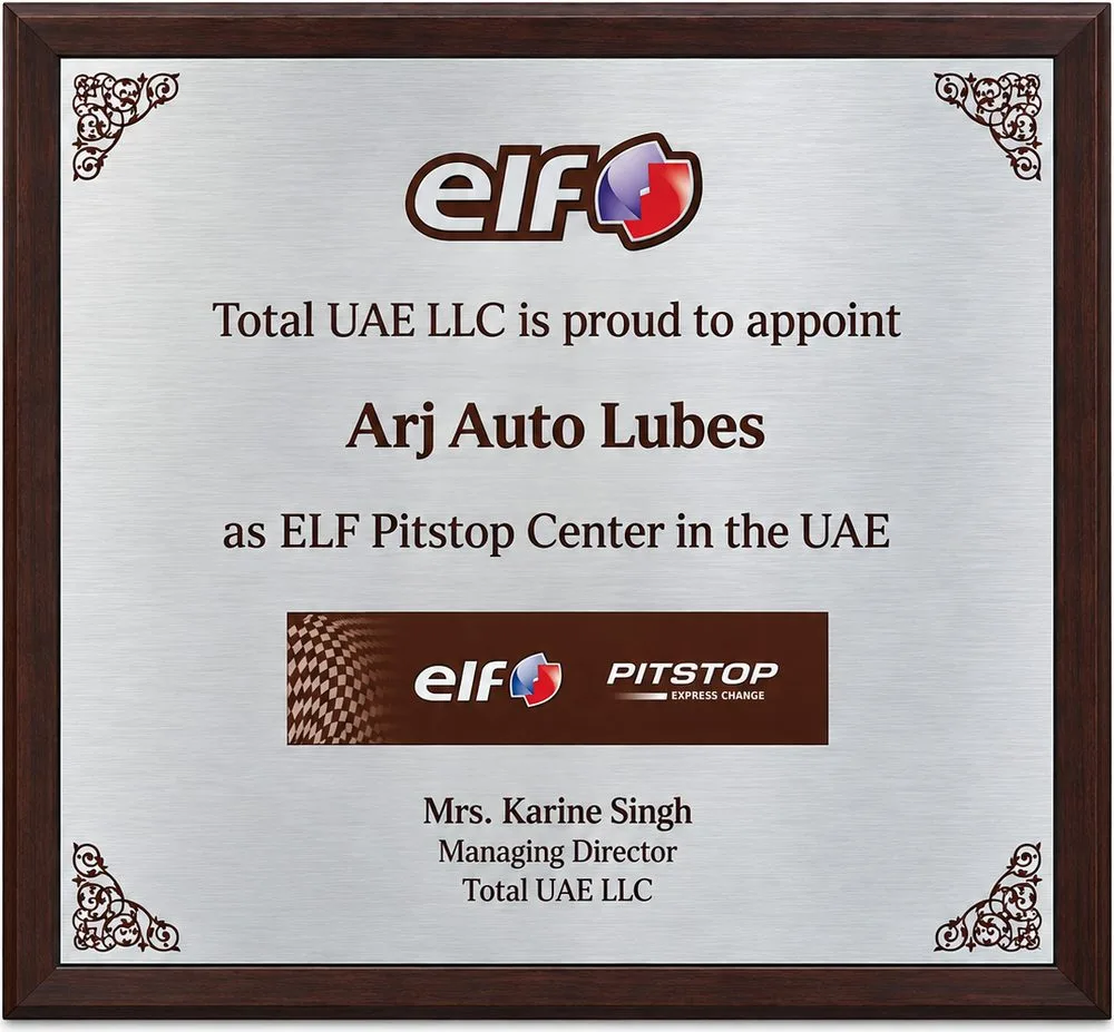 Plaque from Total UAE LLC appointing ARJ Auto Lubes as an ELF Pitstop Center in the UAE, signed by Managing Director Mrs Karine Singh